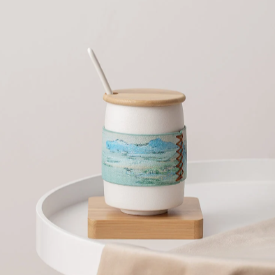 Yuku Hand-Painted Leather Sleeve Mug