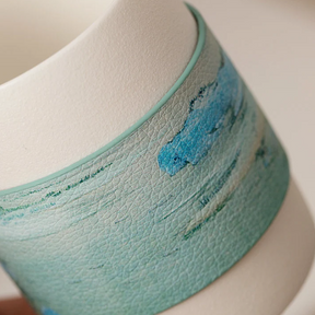 Yuku Hand-Painted Leather Sleeve Mug